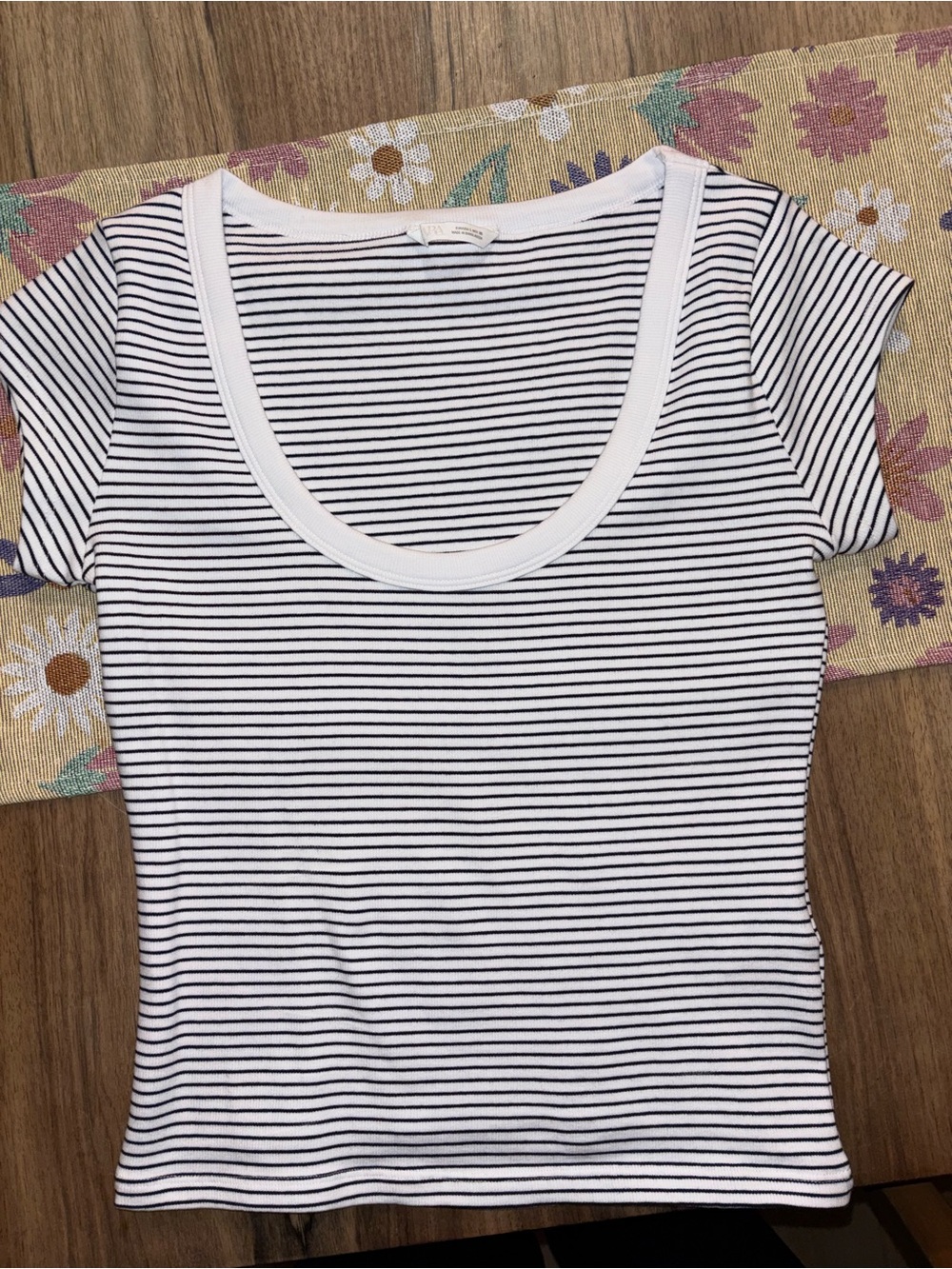 Women’s black and white striped scoop neck shirt